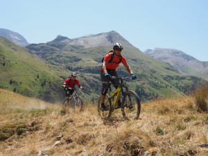 ION Bike Short Sabotage biking on a Ridge line in Les 2 Alps